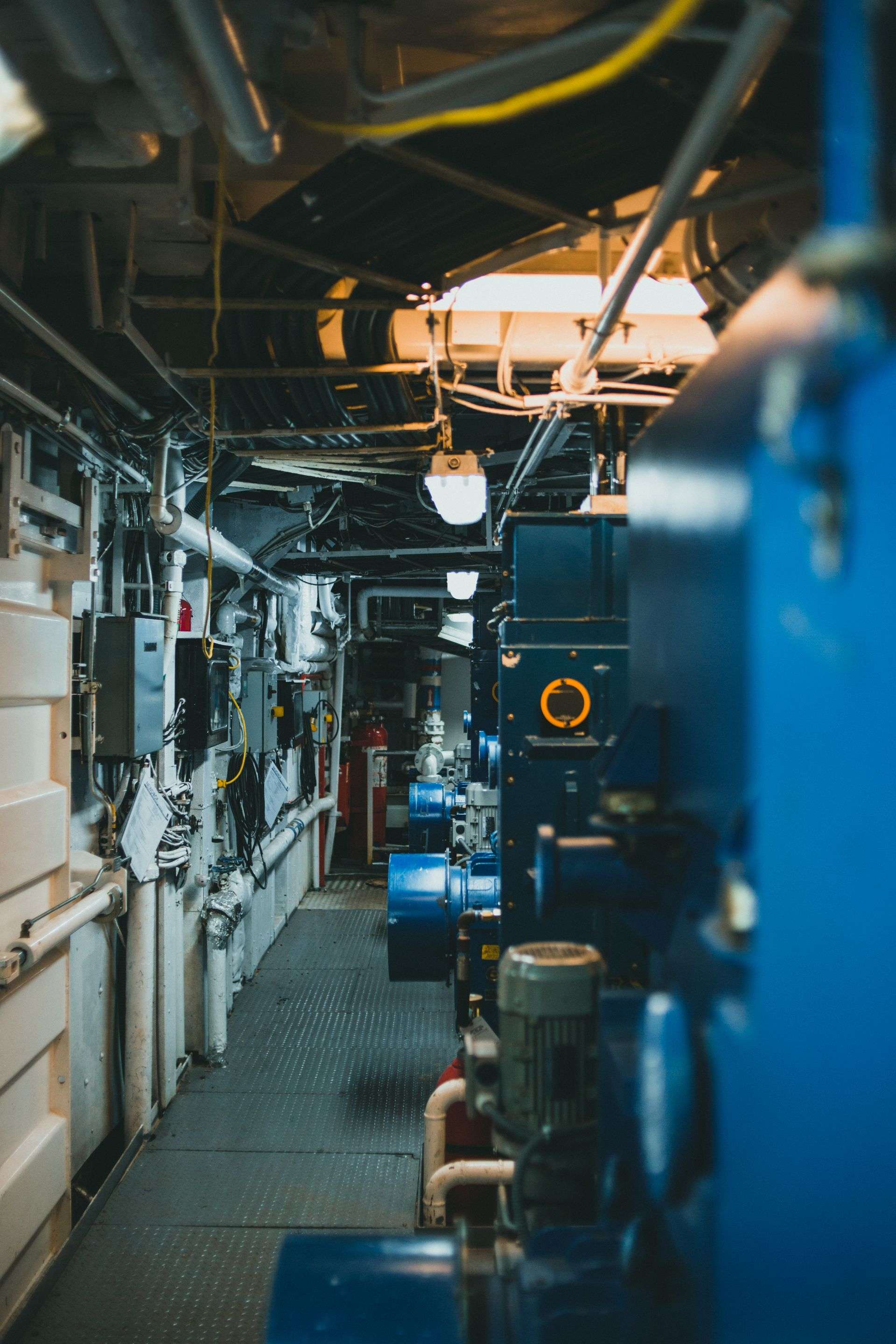 Main engine machinery inside a ship's engine room